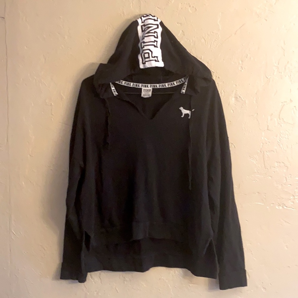 Black Victoria’s Secret hoodie with white accents.